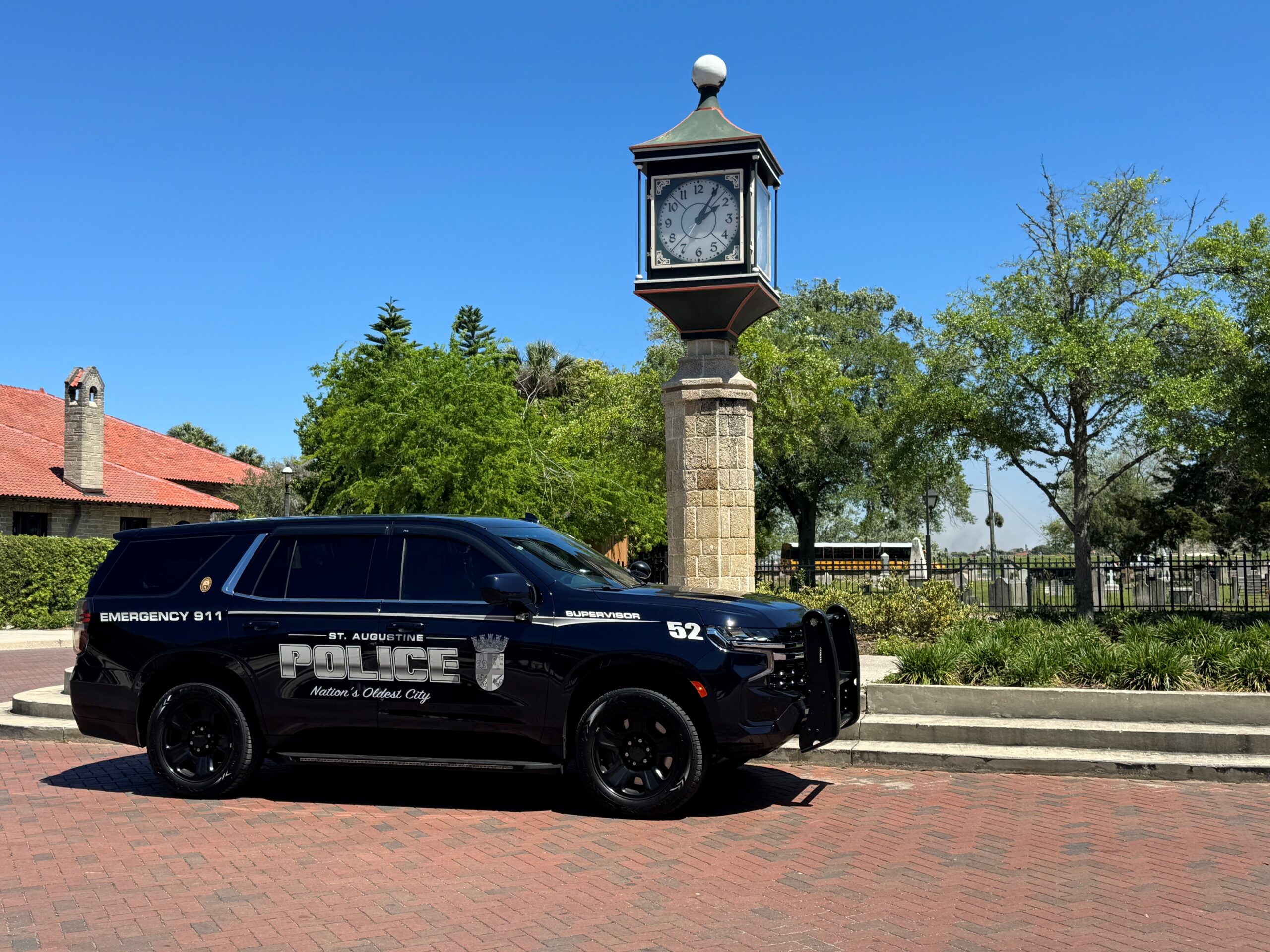 St. Augustine Police marked supervisor patrol vehicle #52 parked in front of the clock tower located at the St. Augustine Visitor&rsquo;s Information Center.